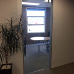 Office glass sliding door and wall installation